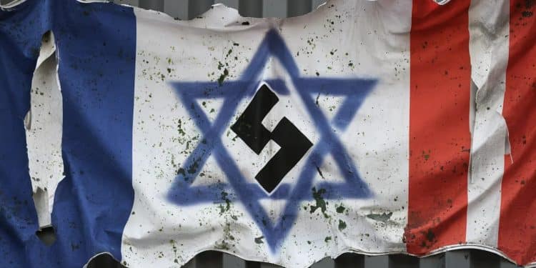 Une banderole politique vandalisée par des symboles antisémites en Nouvelle-Aquitaine - Viral Mag Une croix gammée et une étoile de David taguées sur une banderole électorale une attaque condamnée par de nombreux élus en cette période de montée de lextrême droite Viral Mag