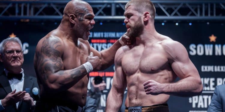 Tyson Gifle Jake Paul Lors De Leur Face-à-Face Avant Le Combat - Viral Mag Mike Tyson légende de la boxe a giflé le YouTubeur Jake Paul lors de leur ultime face à face avant leur combat très attendu Découvrez les détails et les réactions à ce clash surprenant Viral Mag