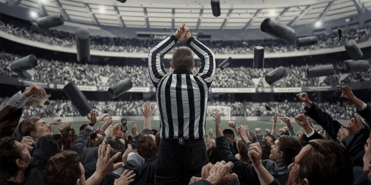 Violences inqualifiables envers un arbitre assistant lors de Bastia-Lorient - Viral Mag Projectiles lancés sur un arbitre lors de Bastia Lorient en Ligue 2 le syndicat des arbitres dénonce des faits dune violence rare Réactions indignées Viral Mag